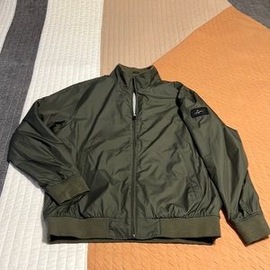 Greg Norman windbreaker. Olive green, mens size large